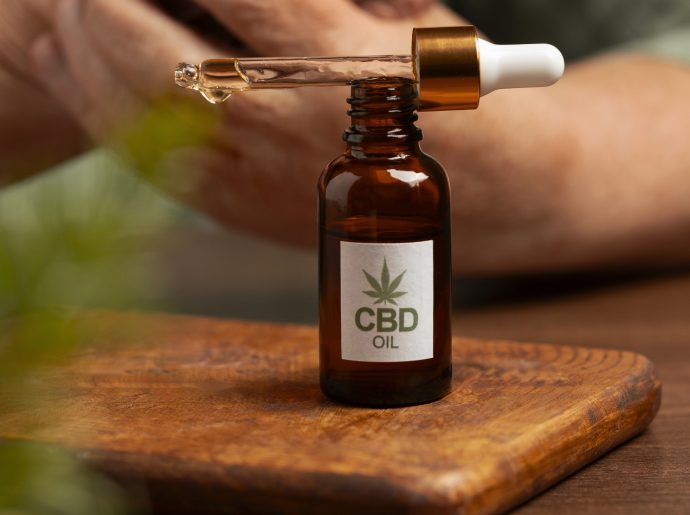 boomers using cbd oil cream treating body pain 690x515